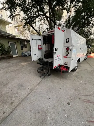 Magnet Plumbing service vehicle on-site for Grease Trap Cleaning in Villa Monterey